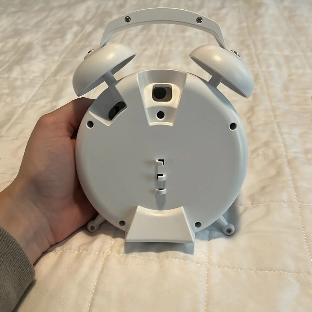 Google nest mini 2nd generation, with alarm clock case.